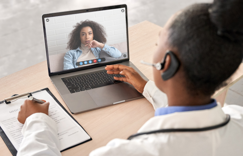 A Woman Using Telehealth Services Image